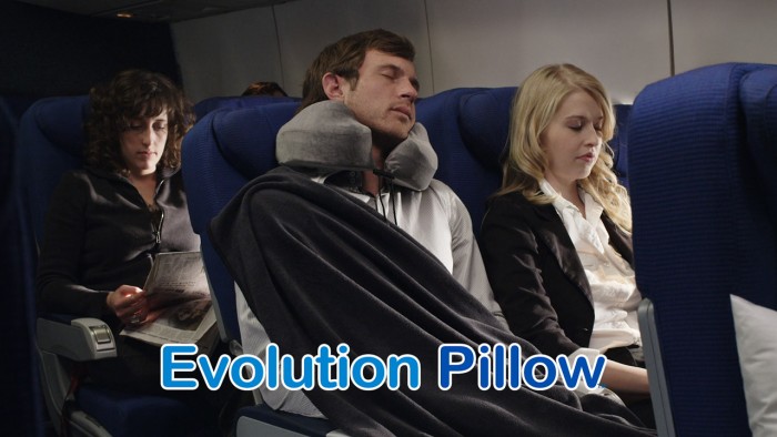 man using travel pillow in product infomercial