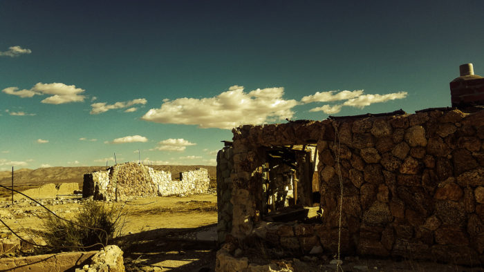 abandoned stone house in desert 4