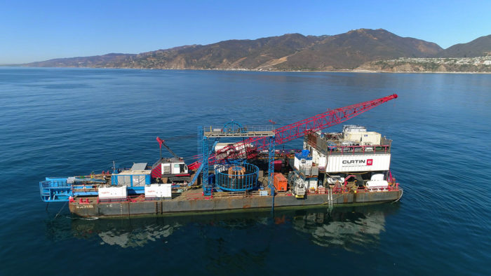 aerial drone shot of offshore barge for installation of electrical cabling for city of Los Angeles