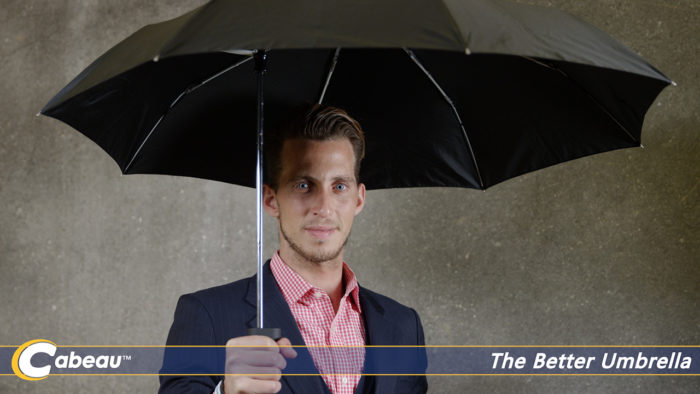 man with a travel umbrella for video marketing production
